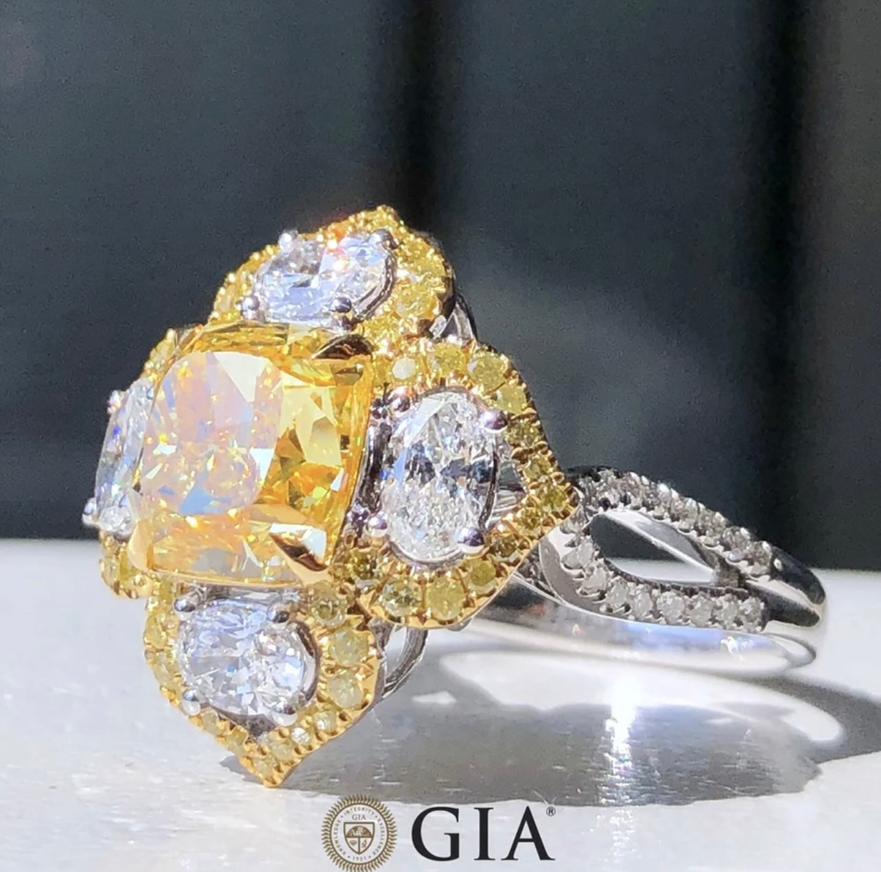 Fancy 6.00 Carat Center Vivid Yellow Diamond Ring set on Solid 18K White and Yellow Gold Diamond Ring GIA Dossier’s ( 20.00 TCW )