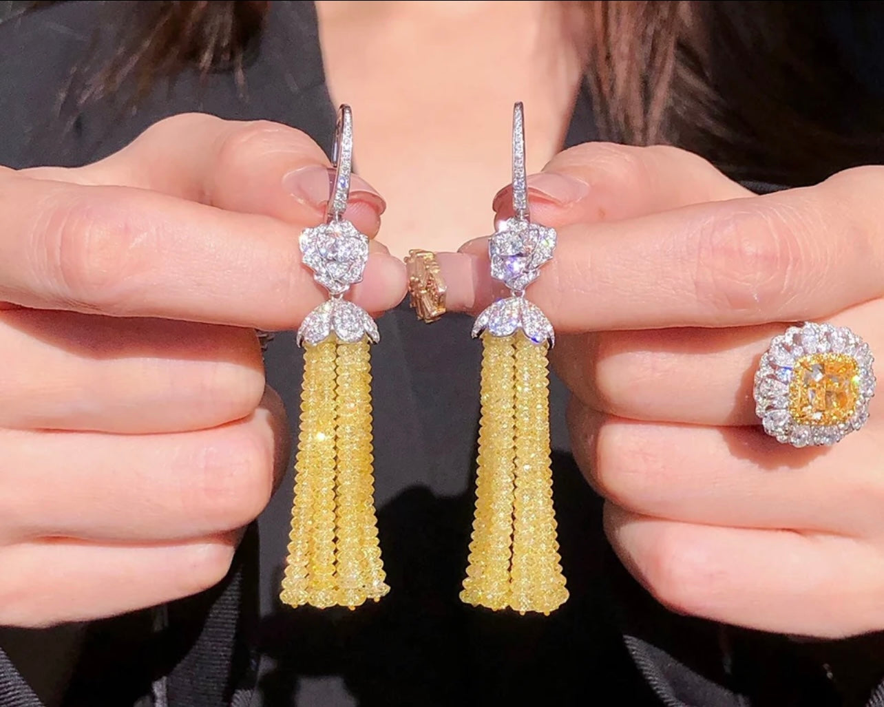 200 Carats of Diamonds set Exclusively 18K white and Yellow gold Diamond Earrings GIA .