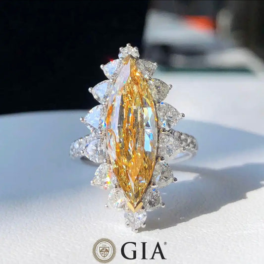 8.00 Carat Fancy Vivid Canary Colour Diamond Which is Brilliantly Cut in Marquise style Exclusively made GIA Dossier.